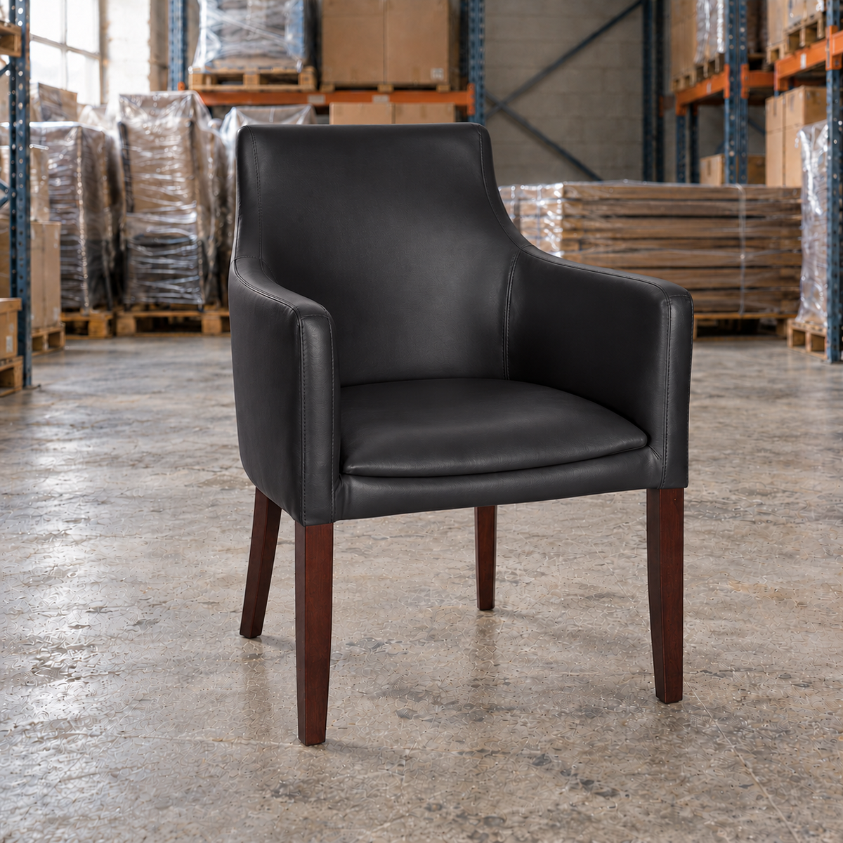Maple Armchair in black faux leather with dark wooden legs